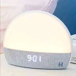 Brand new Hatch, with box. Reading light, sound machine, alarm clock.